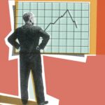 531828213 businessman looking at a graph