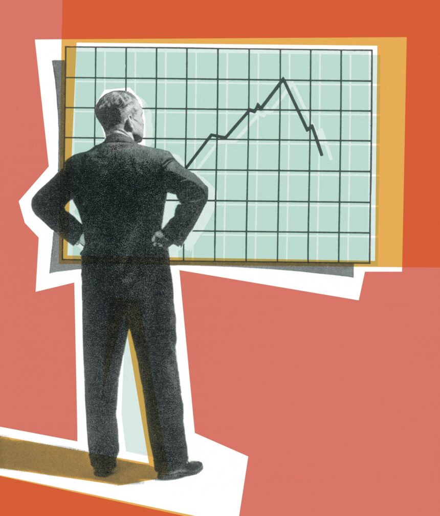 531828213 businessman looking at a graph