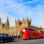 Double decker20buses20and20black20cab20with20Big20Ben20and20Houses20of20Parliament20in2