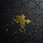 Gold jigsaw puzzle piece 1200x675