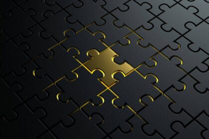 Gold jigsaw puzzle piece 1200x675