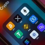 Smartphone20showing20different20cryptos id 7e86d2a3 5578 419e 9b4b 12e05b7e3321 size900