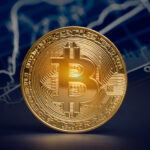 a gold coin with the bitcoin symbol on its face