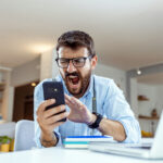 angry investor with smartphone