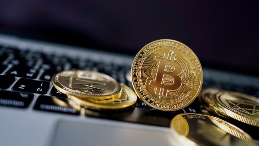 crypto bitcoins computer keyboard iStock 1318240451