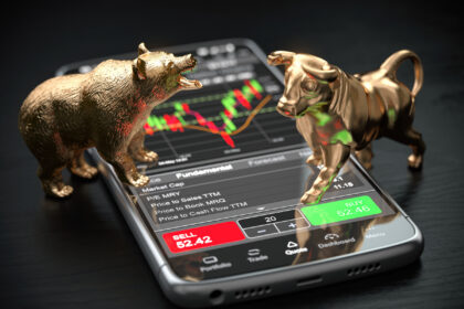 gettyimages bull bear phone buy sell stock chart
