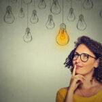 light bulb drawings with a person thinking