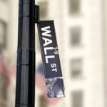 wall street sign dangling