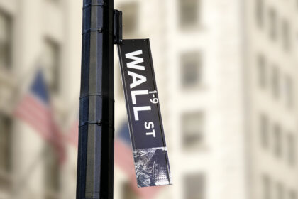 wall street sign dangling