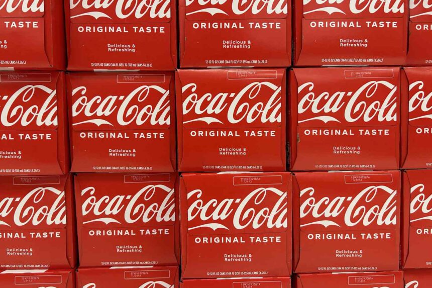 Coca-Cola Shares Surge After Strong Quarterly Earnings and Bottler Stake Sale Announcement 1 GettyImages 2206414146 93d4b45c2bf4437bac8fd26bfce0ad44