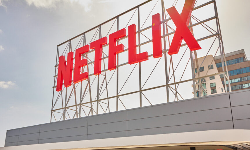 Netflix Approaches $1,200 Share Price: Is a Stock Split Imminent? 1 building with netflix logo on top netflix