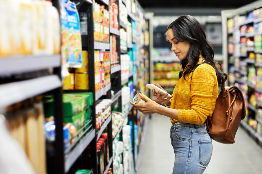 person shopping in a grocery store aisle