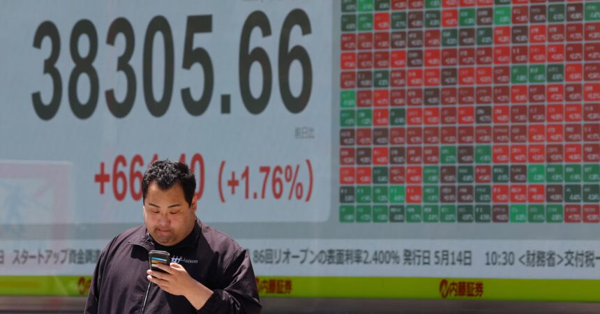 Asian Shares Plunge Amid Hawkish Fed Comments and Economic Uncertainty 1 AXJW4LUDDJJQZJQFX5HLCXZRTY