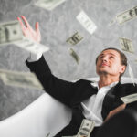 investor throwing cash in air