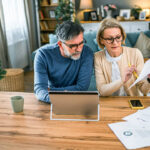 couple doing taxes getty