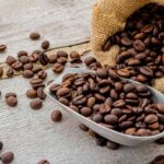 Dark20roasted20coffee20beans20with20scoop20by20Rattanapol20via20Shutterstock