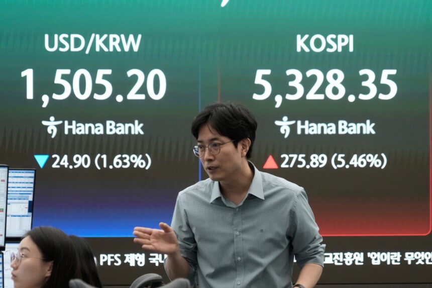 Asian Markets Surge on Renewed Hopes of Iran War De-Escalation 1 urlhttps3A2F2Fassets.apnews.com2F1c2F372F8032285021885ad83b747ca06d922F2cc06c1b81a14eddbe3a