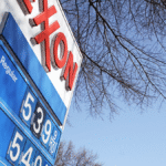 exxon rises amid oil carnage