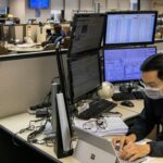 107042544 1649239773218 gettyimages 1206987890 mc covid19stockmarket 0387