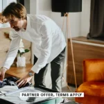 SOCIAL IMAGE PARTNER OFFER TERMS APPLY Business traveler packing up suitcase in hotel Anchiy SOCIAL