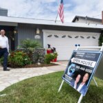 home for sale person walking getty