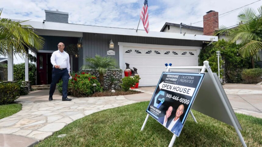 Housing Market Faces Challenges as Prices and Costs Soar Amid Rising Mortgage Rates 1 home for sale person walking getty