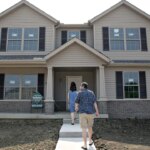 home sale couple open house