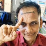 meme coin man tattoo name forehead